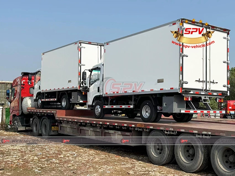 Another 2 Units of ISUZU 4 Tons Cold Van Trucks Loaded Onto Flatbed Truck